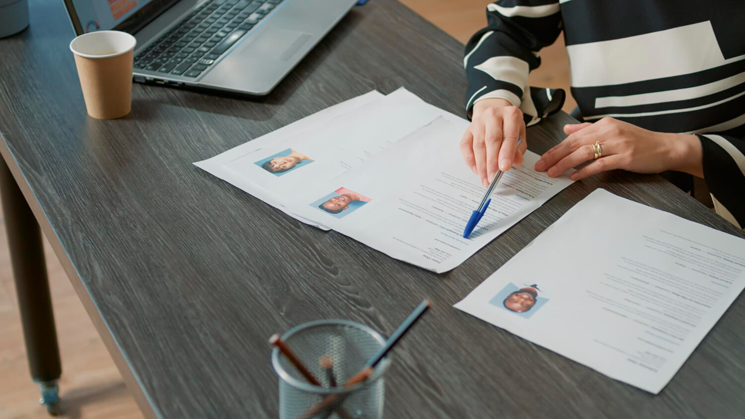 Office worker analyzing candidate CV